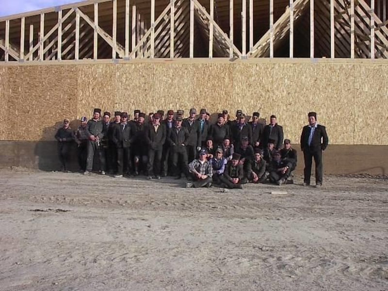 Construction workers from the Hutterite Big Sky Colony in northwestern Montana. The colony contends a Montana law forcing it to purchase workers' compensation insurance violates its religious beliefs. The Hutterites have asked the U.S. Supreme Court to he