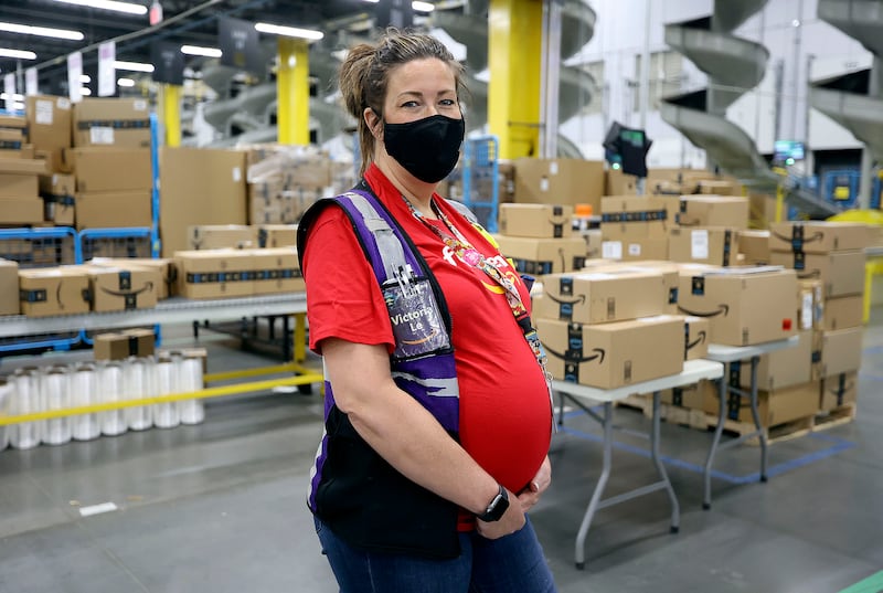 Victoria Le, Amazon assistant general manager, poses for a portrait at the Amazon Fulfillment Center in Salt Lake City on Friday, May 7, 2021.
