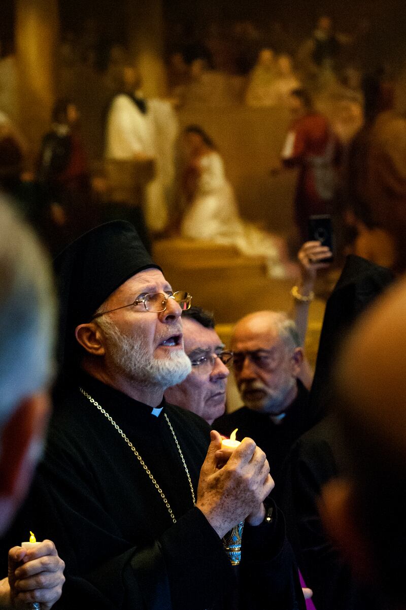 With the painting of "Baptism of Pocahontas" on the wall behind him, His Eminence Metropolitan Joseph, Archbishop of the Antiochian Orthodox Archdiocese of New York and North America joins others in prayer in the Capitol Rotunda of the U.S. Capitol, durin