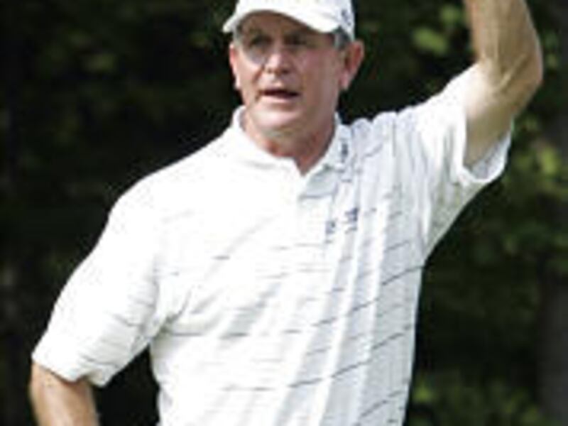 Bruce Summerhays acknowledges the crowd after making a birdie on the 18th hole to win the Kroger Classic on Sunday afternoon.