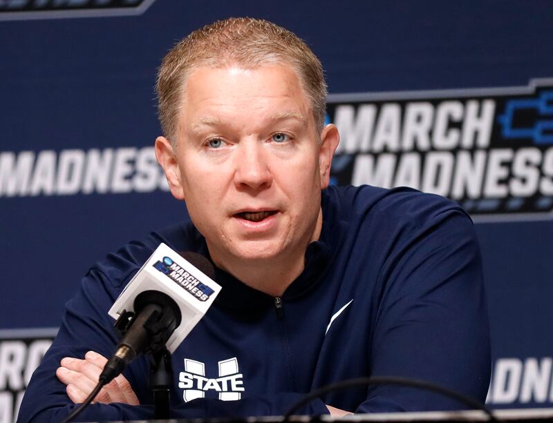 Utah State coach Jerrod Calhoun responds to questions from the media March 20, following USU's 72-47 loss to UCLA in the first round of the NCAA Tournament at Rupp Arena in Lexington, Kentucky. On Tuesday, reports surfaced that Calhoun will be remaining at Utah State.