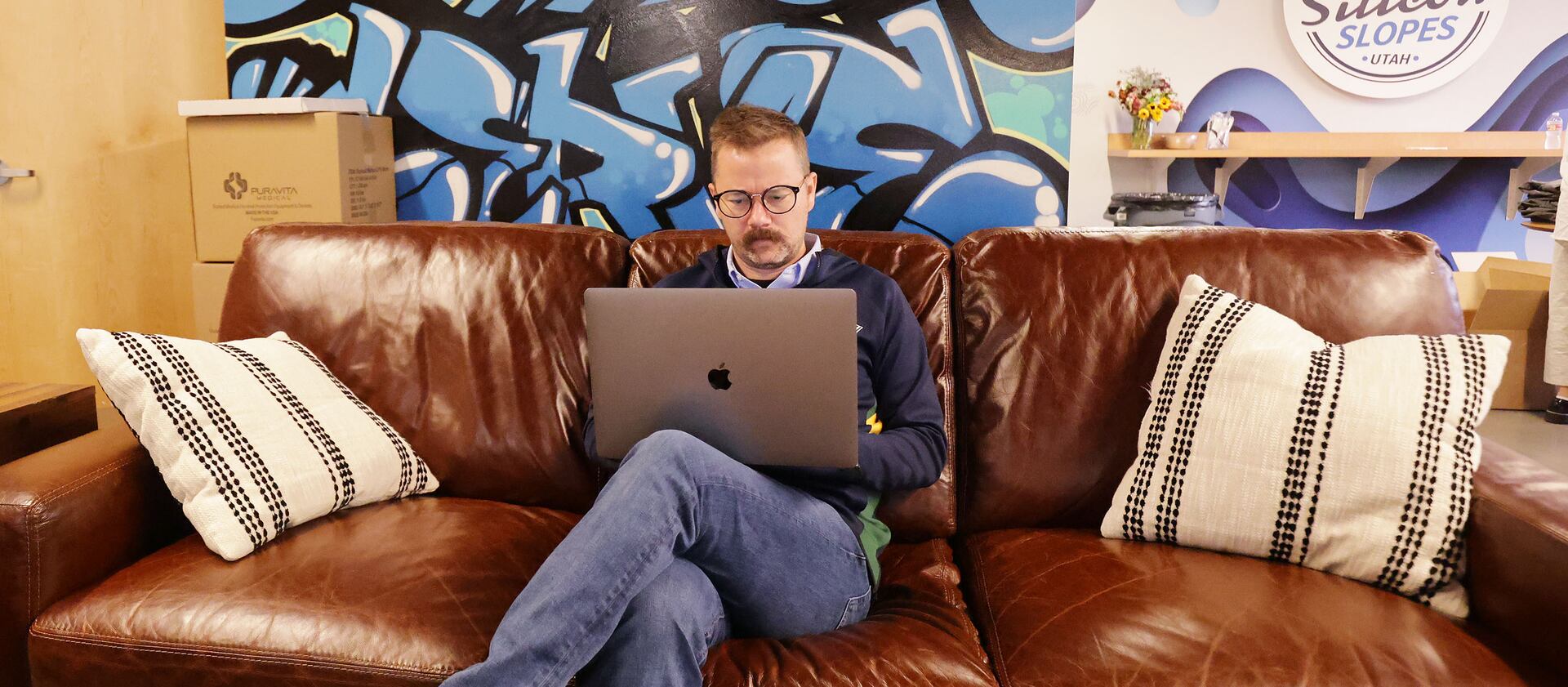 Silicon Slopes Executive Director Clint Betts works at the organization’s office in Lehi on Friday, Oct. 8, 2021.