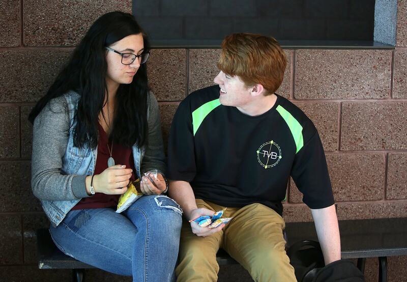 Maklayne and Bobby, who is learning to manage his stress and anxiety, eat lunch together at Murray High School in Murray on Thursday, May 17, 2018.