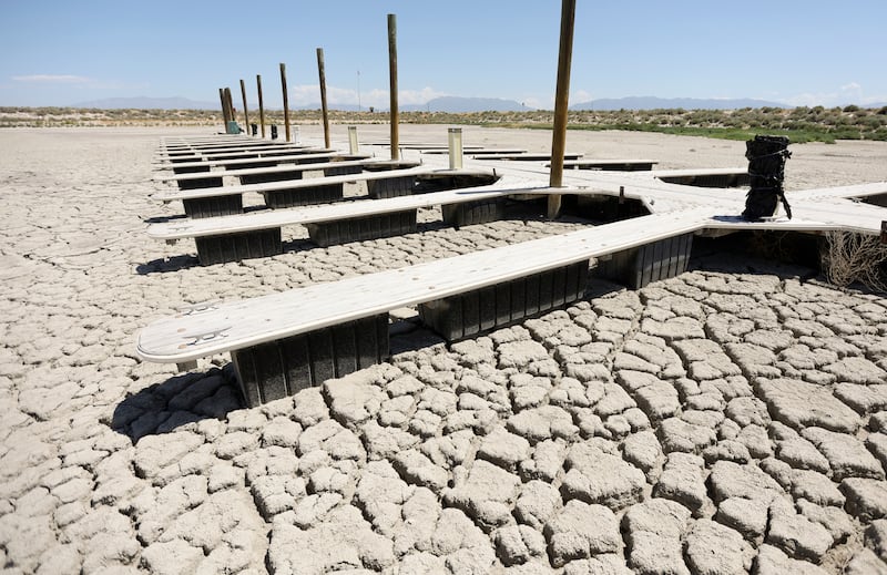 The Antelope Island marina is dried up as the Great Salt Lake experiences record low water levels.