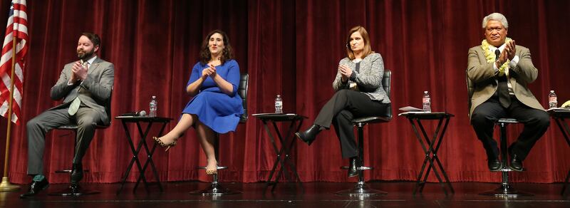Arlyn Bradshaw, Shireen Ghorbani, Jenny Wilson and Stone Fonua participate in a debate for the Salt Lake County mayoral candidates in Sandy on Thursday, Jan. 24, 2019.