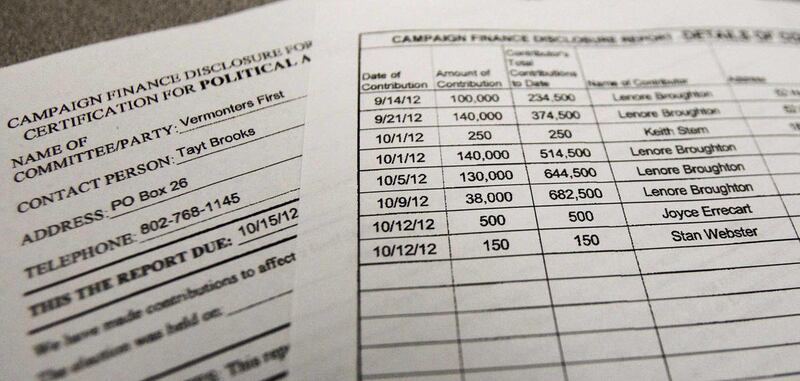 This Wednesday, Oct. 17, 2012 photo shows a copy of a campaign finance report from the new super PAC "Vermonters First" in Montpelier, Vt. A Burlington woman has almost single handedly financed a series of super PAC television ads promoting Republican can
