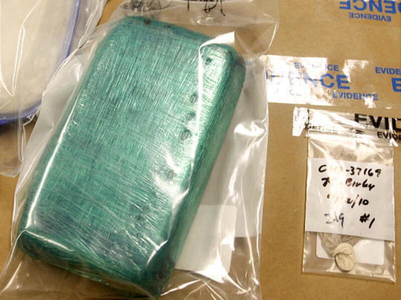 Meth and other evidence sit on the table at the UPD evidence room Friday in South Salt Lake.