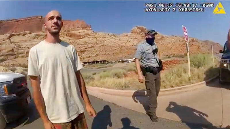 This still from police camera video provided by the Moab Police Department shows Brian Laundrie talking to a police officer.