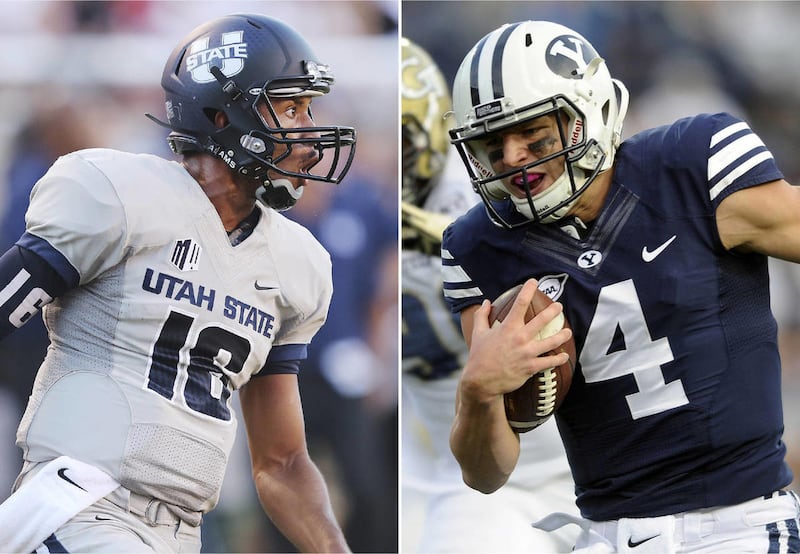 Utah State quarterback Chuckie Keeton, left, and BYU quarterback Taysom Hill were named to the 2014 HeismanPundit/CBSSports.com Heisman Trophy Watch List.