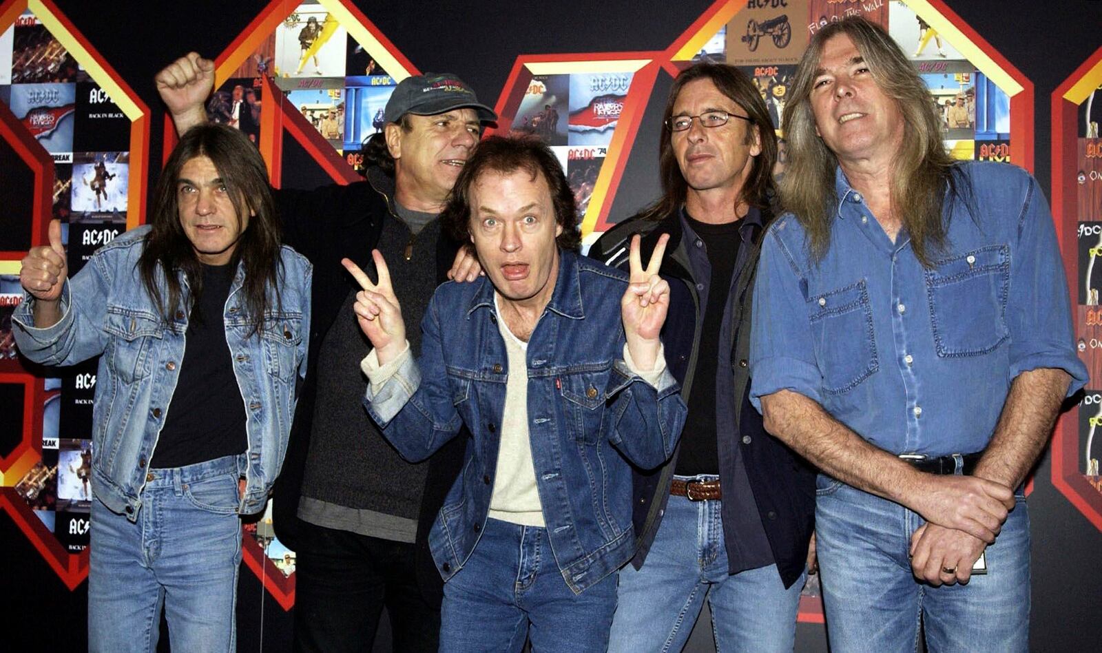 AC/DC founding member Malcolm Young dead at 64 – Deseret News