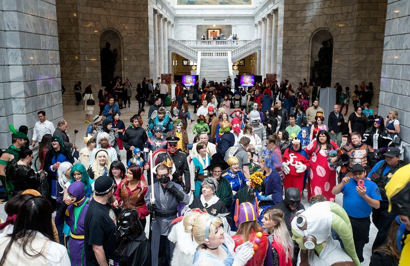 FILE - Cosplayers gather for a group photo before the start of a press conference at the Capitol in Salt Lake City on Wednesday, May 17, 2017.