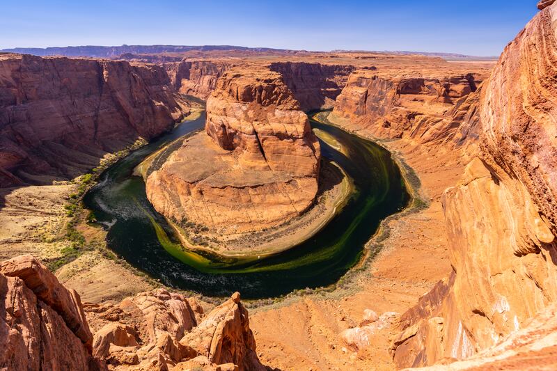 FILE - Parking for a popular tourist attraction where the Colorado River bends in the shape of a horseshoe is being expanded.
