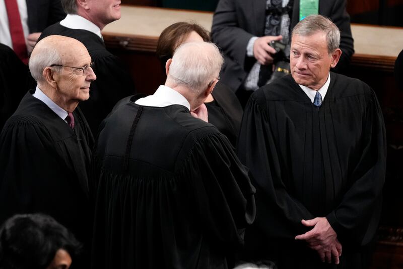 Chief Justice of the United States John Roberts and retired Supreme Court Associate Justice Stephen Breyer arrive at the U.S. Capitol.