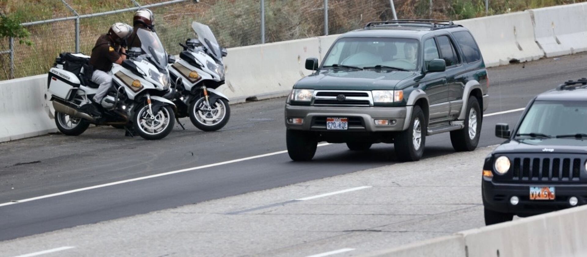 Utah Highway Patrol troopers enforce the speed limit in a construction zone on I-80 near 1700 East in Salt Lake City.