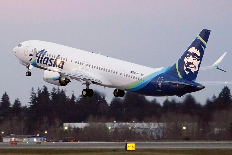 Alaska Airlines passenger flight on a Boeing 737-9 Max airplane.