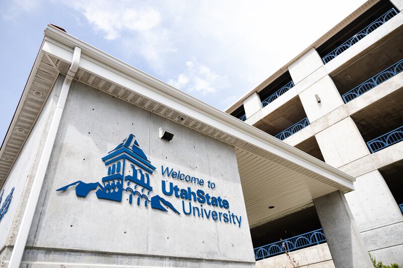 A welcome sign for Utah State University.