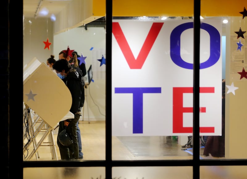Voters cast their ballots at Trolley Square in Salt Lake City on Tuesday, Nov. 3, 2020.