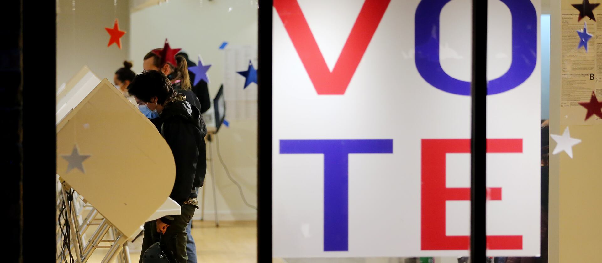 Voters cast their ballots at Trolley Square in Salt Lake City on Tuesday, Nov. 3, 2020.