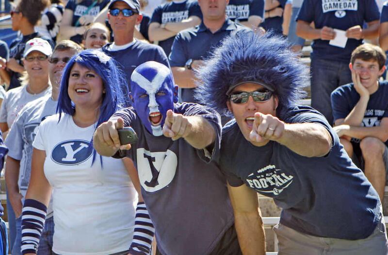 BYU fans celebrate during the first half as Brigham Young University plays Weber State University in football Saturday, Sept. 8, 2012, in Provo, Utah. A recent study showed that the sound in LaVell Edwards stadium can exceed at times 120 decibels.