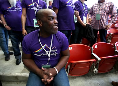 Michael Tate, a member of the San Francisco Gay Men's Chorus, listens to the Mormon Tabernacle Choir practice during soundcheck at the Shoreline Amphitheatre in Mountain View, Calif., on Monday, June 25, 2018.