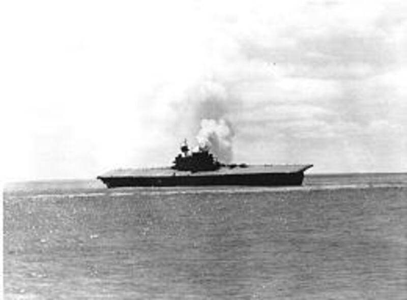 Sixty-five years ago today, June 4, 1942, smoke rises from the U.S. aircraft carrier Yorktown after it is bombed by Japanese planes during the Battle of Midway.
