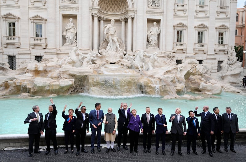 World leaders pose near the Trevi Fountain in Rome during the recent G20 summit.