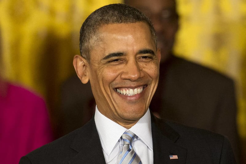 President Barack Obama smiles while speaking about raising the minimum wage for federal contract workers, Wednesday, Feb. 12, 2014. President Barack Obama made a comedic guest appearance on “Between Two Ferns,” a parody talk show hosted by comedian Zach G