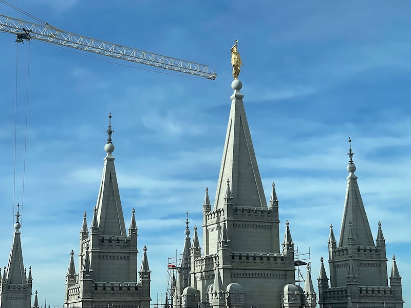 The spires of the Salt Lake Temple bask in unusually warm sunlight on Temple Square in Salt Lake City on Dec. 10, 2025.