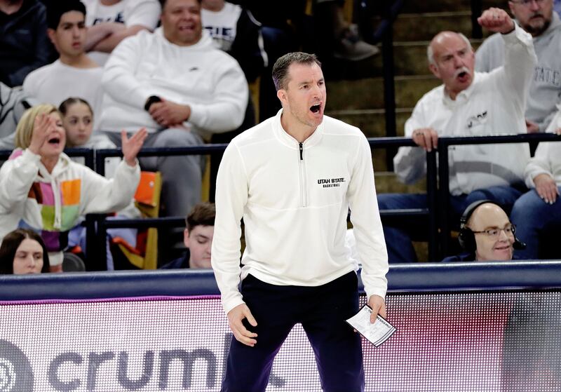 Utah State head coach Danny Sprinkle shares his displeasure over a call during the Aggies' win over San Jose State on Jan. 30, at the Spectrum in Logan.