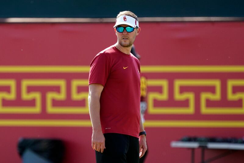 Southern California head coach Lincoln Riley watches his team