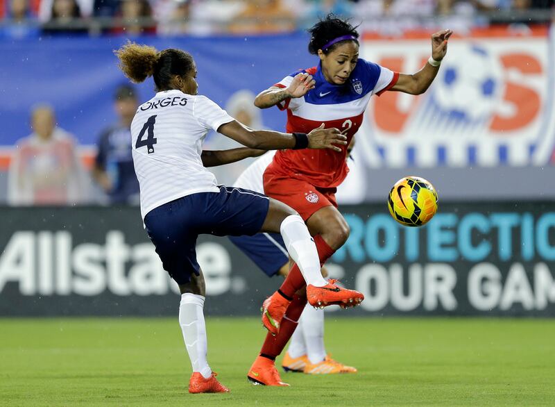 United States forward Sydney Leroux scores past defender Laura Georges during a women’s friendly soccer match Saturday, June 14, 2014, in Tampa, Fla.