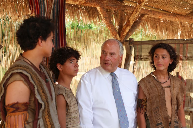 Elder Ronald A. Rasband, of the Quorum of Twelve Apostles, speaks with actors in the Book of Mormon Videos.
