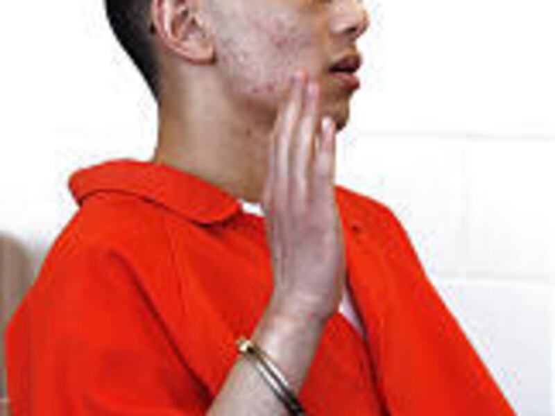 David Van appears Thursday at his first parole hearing. He discussed the 2003 shooting that injured six, including 4-year-old boy.