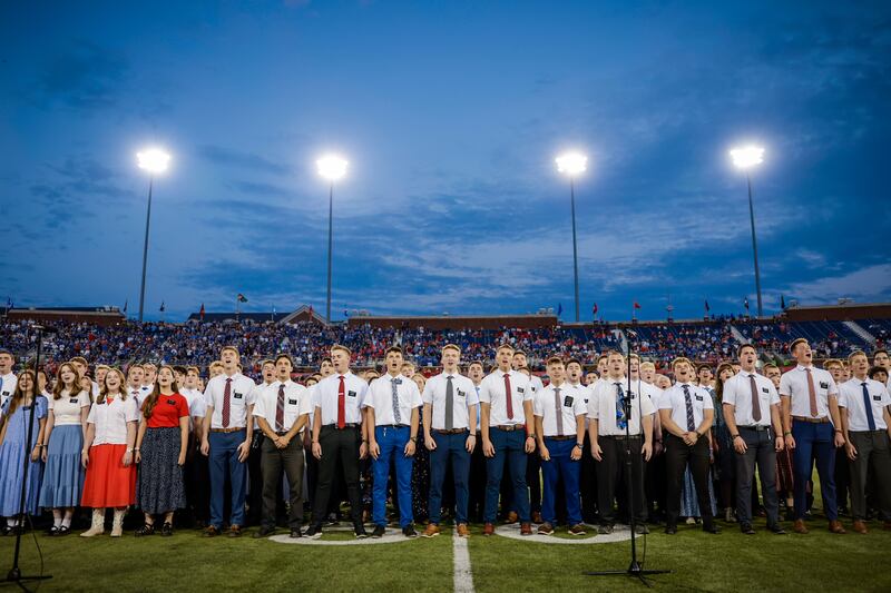 A group of Latter-day Saint missionaries sang “America The Beautiful" during halftime of the BYU-SMU football game at Gerald J. Ford Stadium in Dallas on Saturday night.
