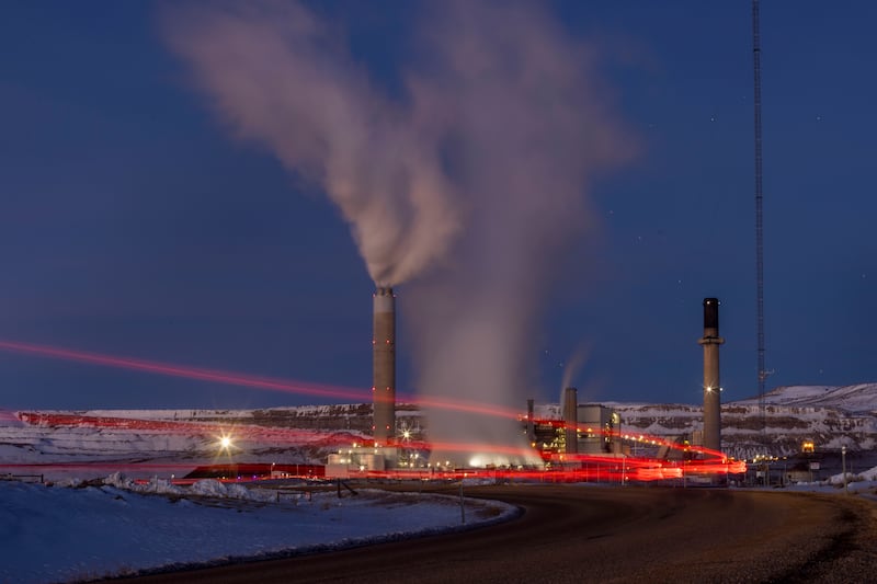 Taillights trace the path of a motor vehicle at the Naughton Power Plant on Jan. 13, 2022, in Kemmerer, Wyoming.