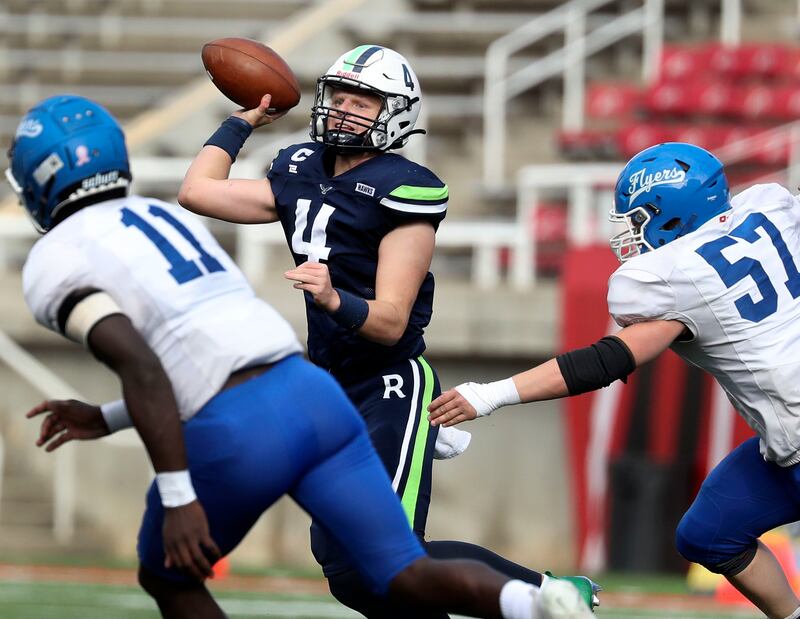 Ridgeline High School football QB Kaden Cox passes the ball during the 2021 4A championship game against Dixie High School.