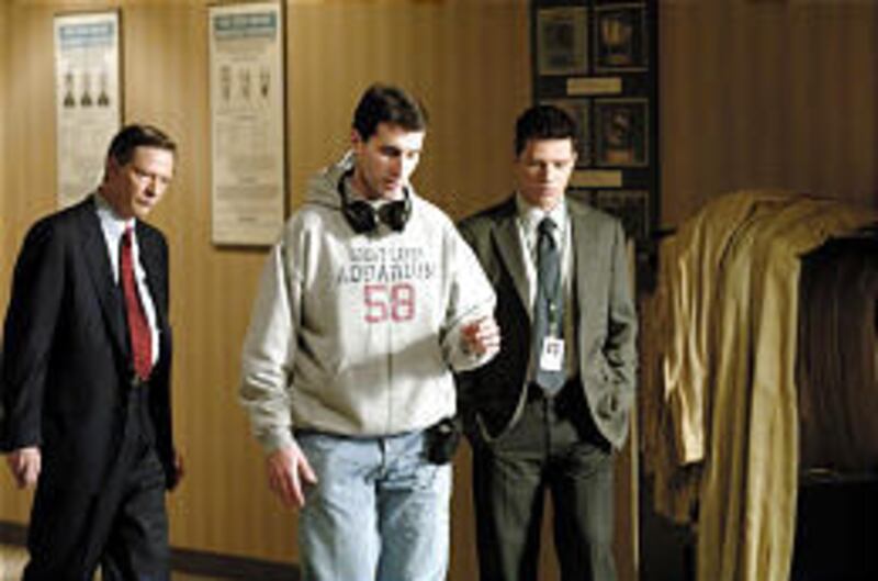 Chris Cooper, writer/director Billy Ray and Ryan Phillippe on the set of the thriller "Breach."