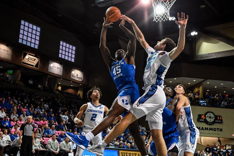 BYU’s Fousseyni Traore has his shot blocked by Creighton’s Ryan Kalkbrenner.
