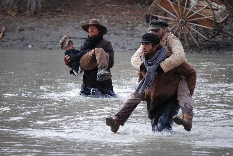 Rescuers carry members of the Martin Handcart Company across the Sweetwater River in director T.C. Christensen's new film, "17 Miracles."