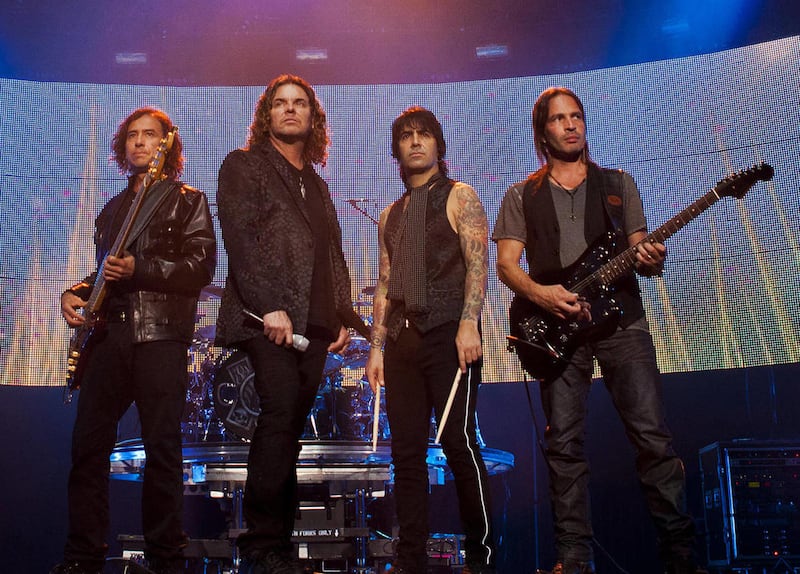 This undated publicity photo provided by Angelo Medina shows Mexican rock band Mana. Mana opened their first tour in four years in Miami on Thursday, July 7, 2011.