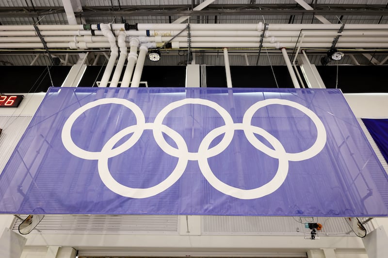 An Olympic rings flag hangs at the Utah Olympic Oval speedskating venue in Kearns.