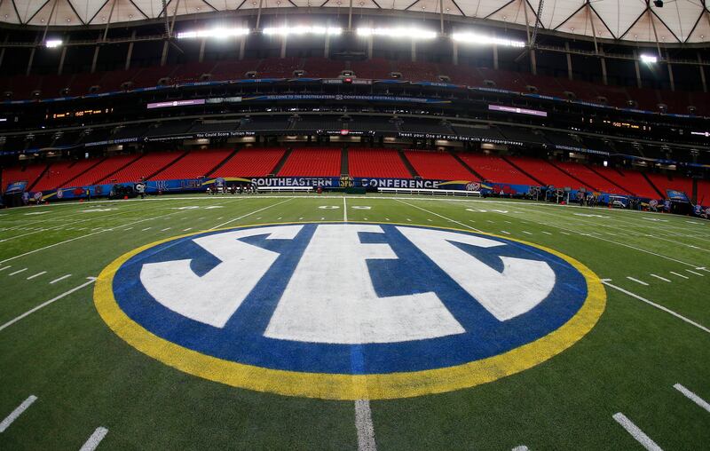 The SEC logo is displayed on the field