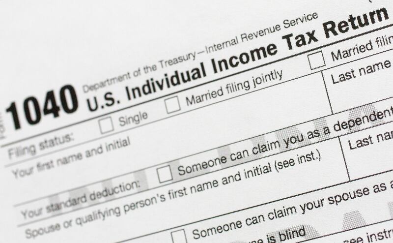 A portion of the 1040 U.S. individual income tax return form is shown July 24, 2018, in New York.