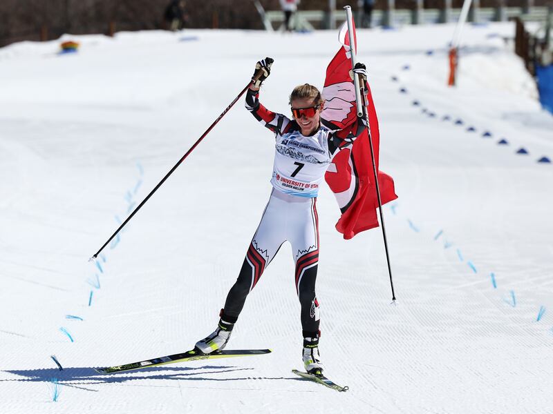 Novie McCabe crosses the finish line in second place in the 15 km freestyle the final day of the NCAA ski championships.