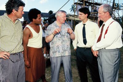Mitch Davis, left, Joe Folau, John H. Groberg, Christopher Gorham and Jerry Molen on the set of "The Other Side of Heaven."