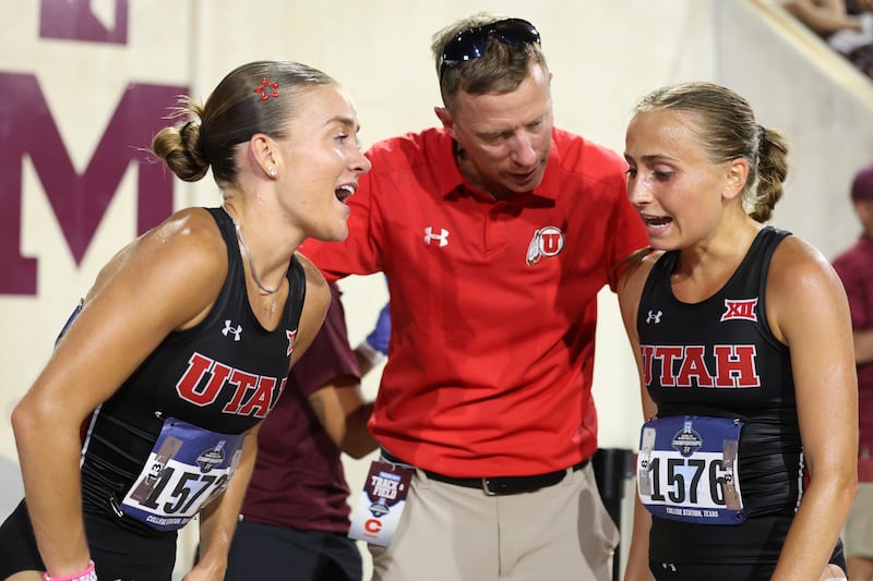 Utah track and field coach Kyle Kepler with two of his runners at the NCAA regionals in College Station, Texas.