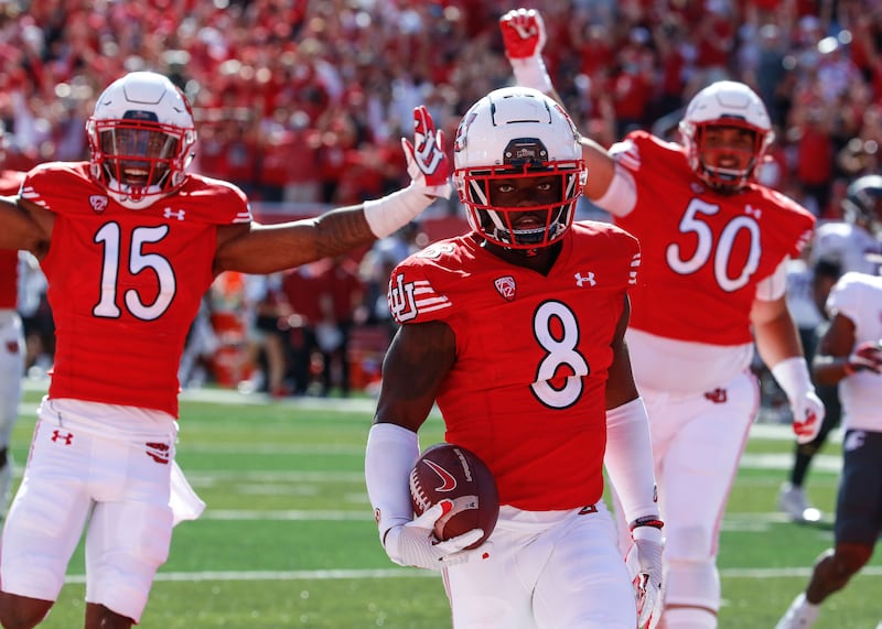 Utah cornerback Clark Phillips III (8) celebrates a touchdown during game against Washington State, in Salt Lake City.
