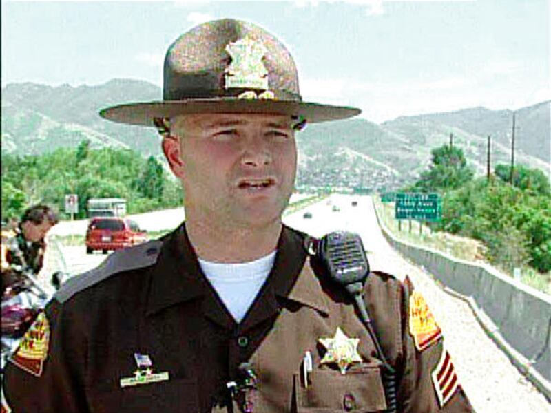 This undated image from video shows former Utah State Trooper Brian Smith, who was sought in Texas on robbery and burglary warrants and according to police shot himself during a standoff in Garland, Texas.