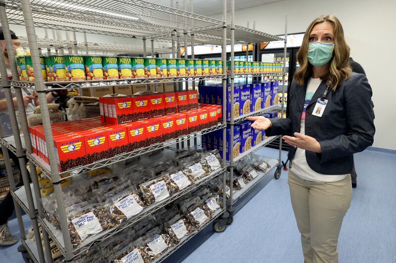 Jessica Strong, Intermountain Primary Children’s Hospital community health director, shows the new Primary Pantry, where patients can get free food.