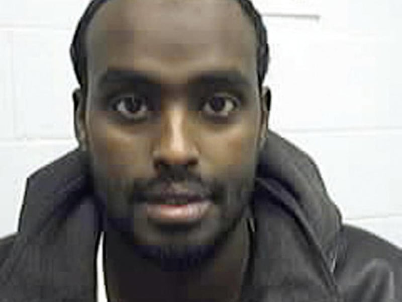 FILE - This undated file photo provided by the U.S. government shows Nuradin Mahamoud Abdi, a Somali immigrant convicted of terrorism charges in Columbus, Ohio in 2007 in a plot to bomb an unspecified area shopping mall. Federal immigration authorities ar